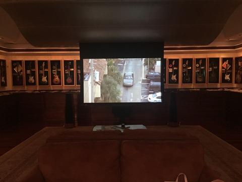 Traditional Home Theater with framed memorabilia
