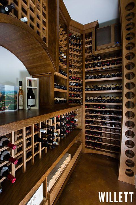 Contemporary Wine Cellar with solid oak custom shelving