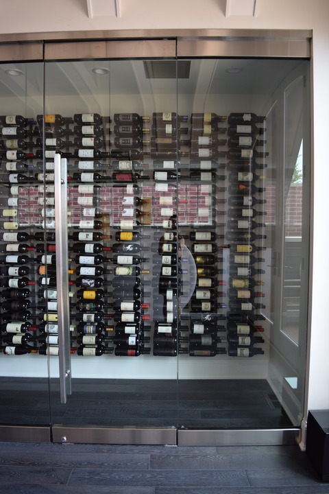 Contemporary Wine Cellar with any floor wine storage
