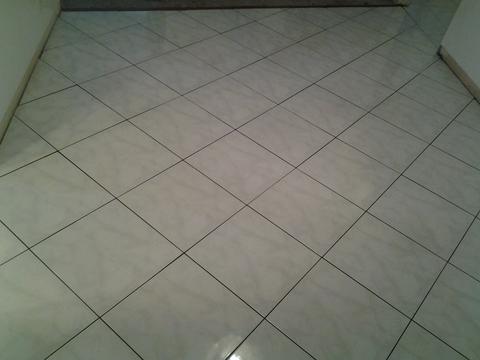 Traditional Dining Room with straight laid tile pattern