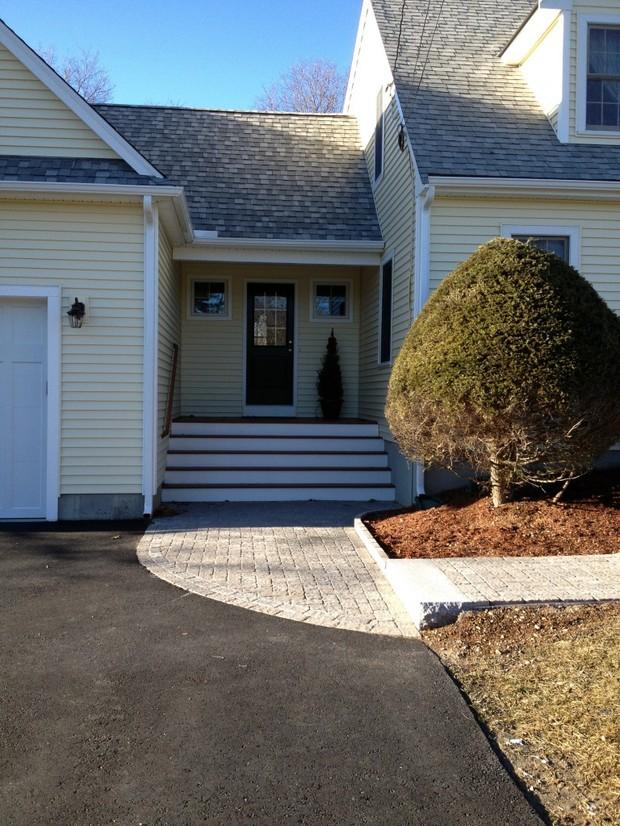 Cape Cod Garage in Mansfield - brick paved walkway, white garage door