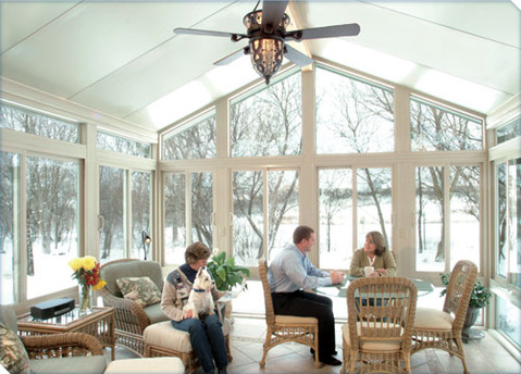 Contemporary Sunroom with ceiling fan and light