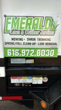 Emerald Lawn & Outdoor Service logo