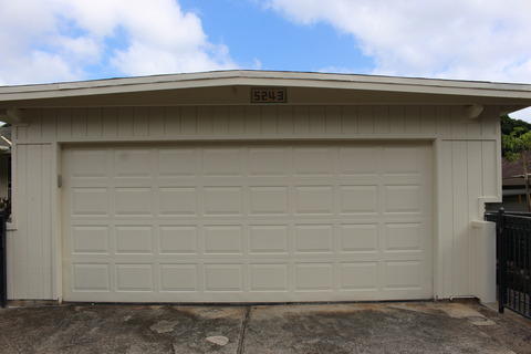 Transitional Garage with raised panel garage door