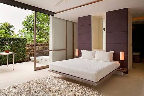Contemporary Bedroom with upholstered wall panels