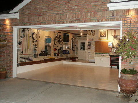 Traditional Garage with painted cement floor