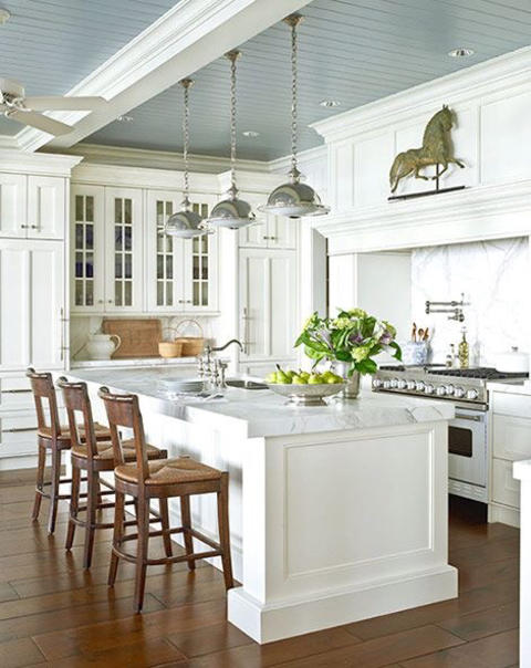 Transitional Kitchen with crown moulding on cabinetry