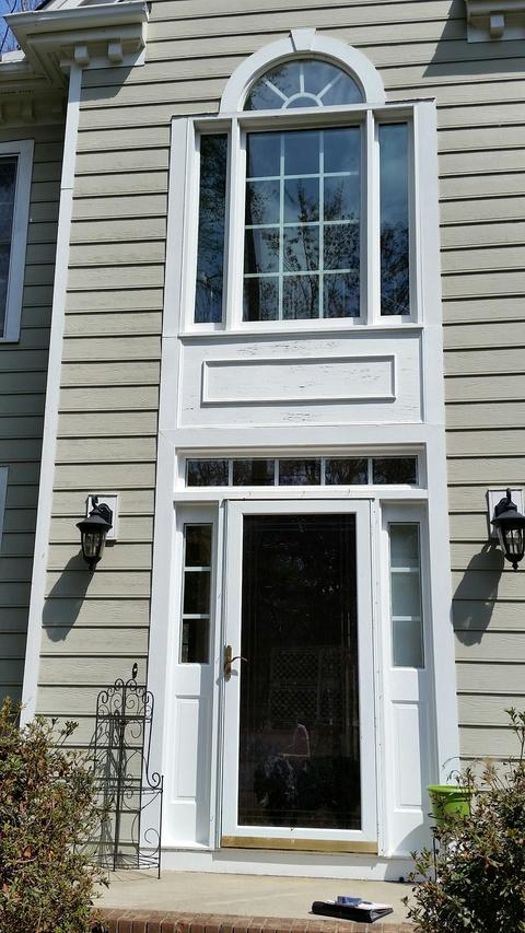 Traditional Home Exterior with glass panel window