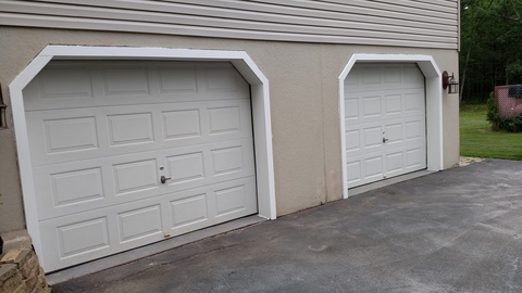 Transitional Garage with clipped garagge door corners