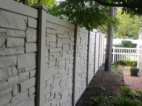 Transitional Landscape with stone wall finish