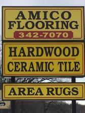 Amico Carpets logo
