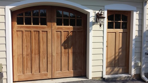 Transitional Garage with sectional garage door