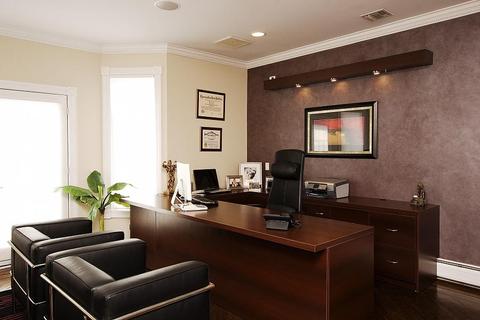 Contemporary Home Office with tuxedo style leather chairs