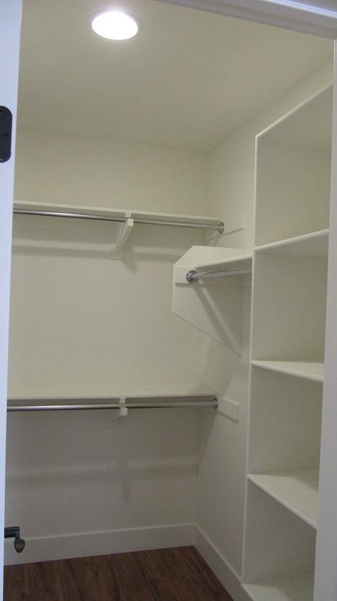 Traditional Closet with built in shelving