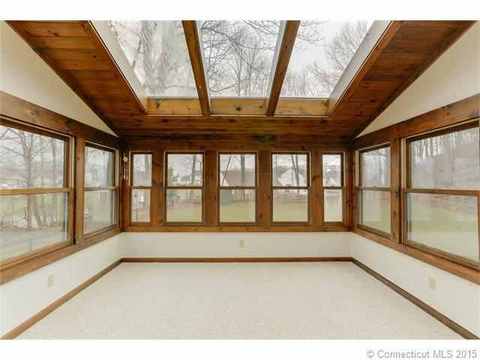 Contemporary Sunroom with double hung windows
