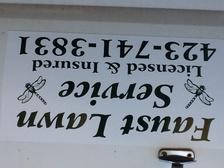Faust Lawn Service logo