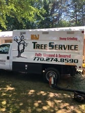 M & J Tree Services & Stump Grinding logo