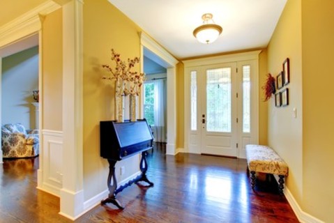 Colonial Entry with yellow painted walls