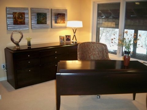 Contemporary Home Office with tan wall to wall carpet