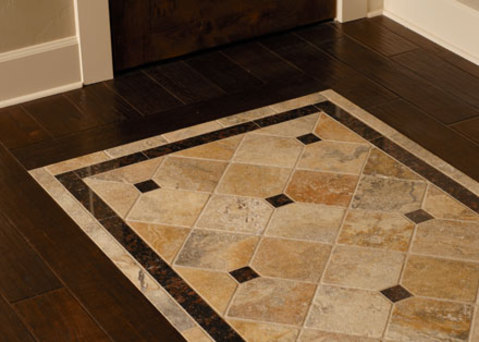 Transitional Entry with tile and hardwood flooring