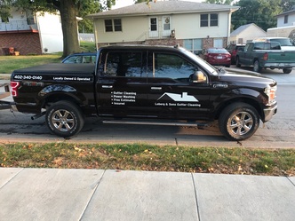 Loberg and Sons Gutter Cleaning logo