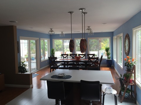 Contemporary Dining Room with blue painted walls