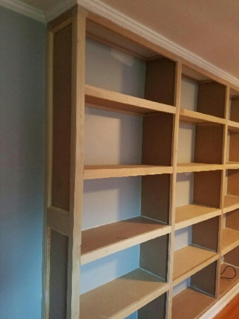 Transitional Library with natural wood book case