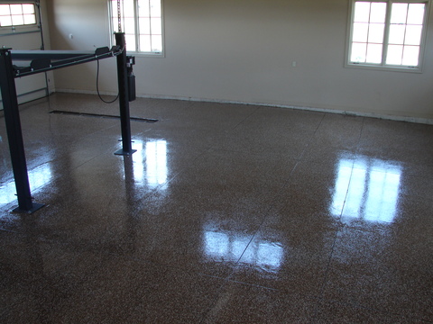 Transitional Garage with epoxy coated concrete floor