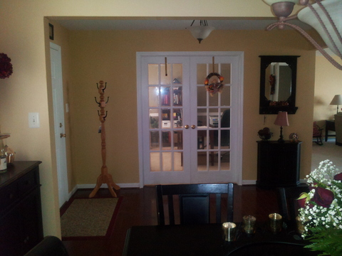 Transitional Entry with entry open to dining room