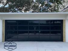 Logo for H & H Garage Doors