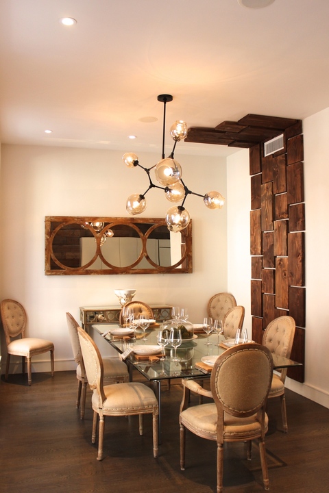 Modern Dining Room with tufted round back chairs