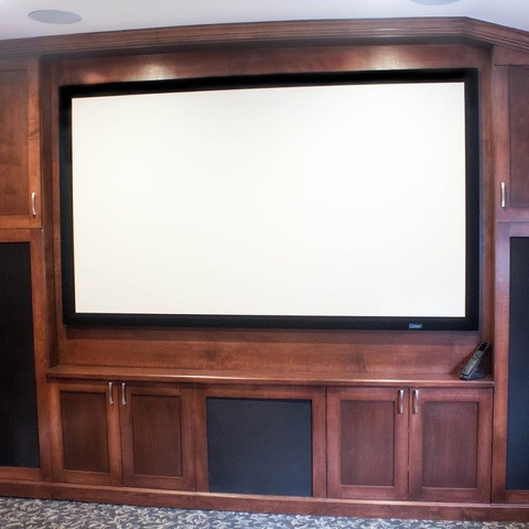 Traditional Home Theater with recessed panel cabinets