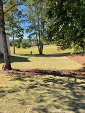 Logo for Simmons Lawn Care