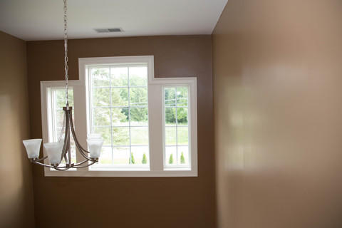 Transitional Entry with milk chocolate brown walls