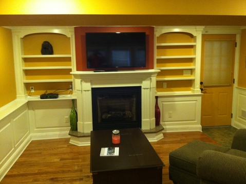Transitional Library with mustard yellow wall color