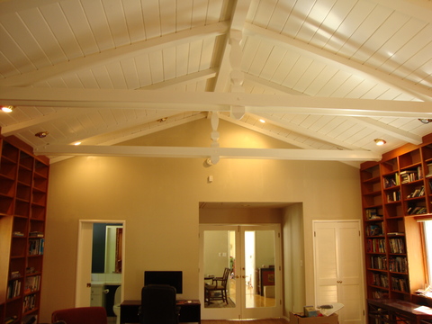 Cottage Library with white painted ceiling beams