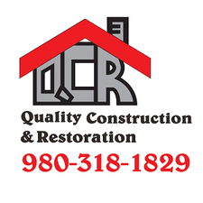 Quality Construction and Restoration Co. logo