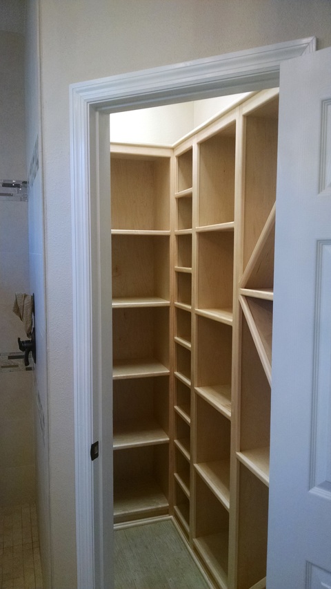 Traditional Closet with white maple slab flat front cabinet
