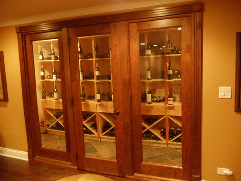 Contemporary Wine Cellar with walk in wine cellar