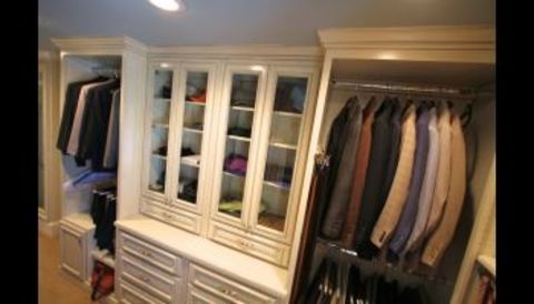Traditional Closet with recessed panel cabinets