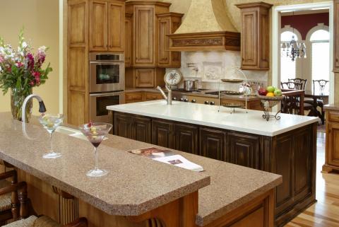 Traditional Kitchen with kitchen island with dark wood cabinets