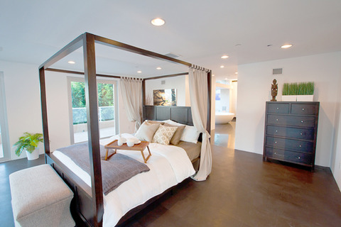Contemporary Bedroom with sliding glass doors leading to the outside