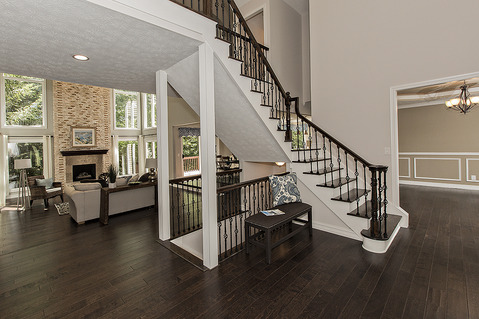 Contemporary Entry with iron spindle baluster rails