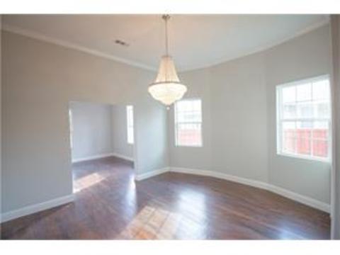 Transitional Dining Room with plain white crown molding