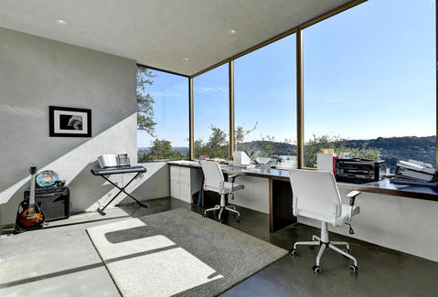 Contemporary Home Office with white rolling office chair