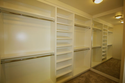 Traditional Closet with large walk-in closet