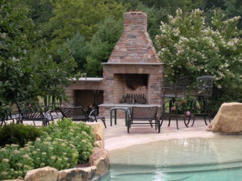 Traditional Fireplace with black metal outdoor patio furniture