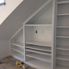 Transitional Library with under staircase storage
