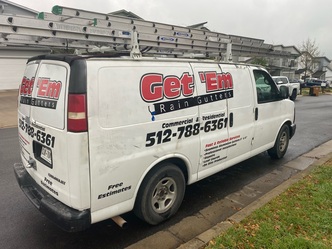GEt 'Em Rain Gutters logo