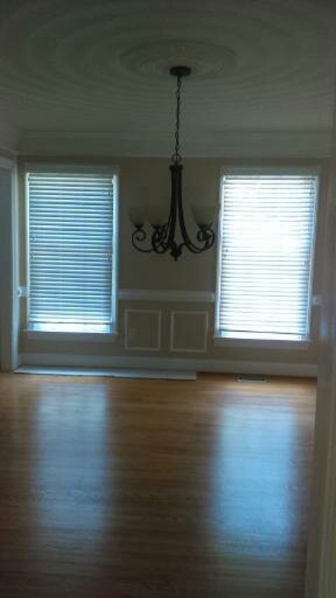 Transitional Dining Room with shadow box wall molding